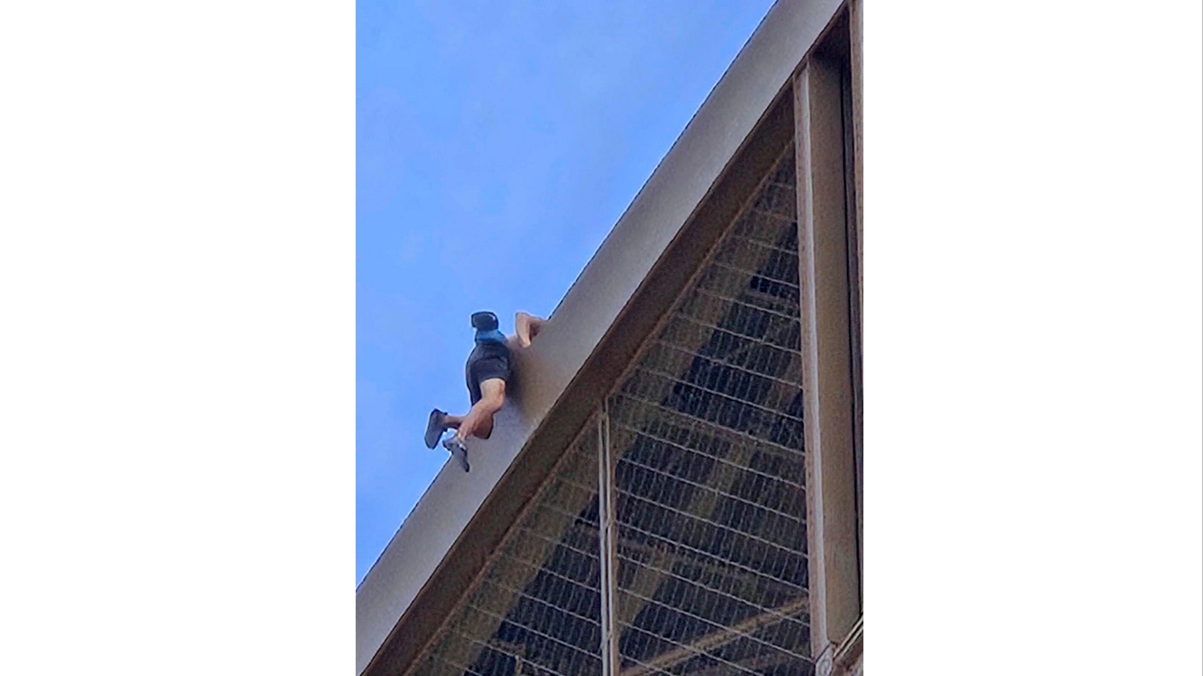 <div class="paragraphs"><p>a man climbs the Eiffel Tower, during the 2024 Summer Olympics, Sunday.</p></div>